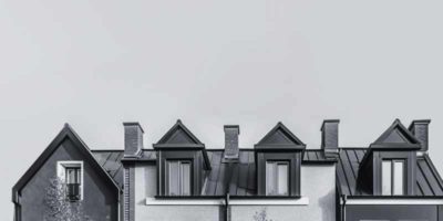 Mortgage Finance Brokers have rebranded, this is part of their new website image. It shows a row of rooftops across terraced properties.